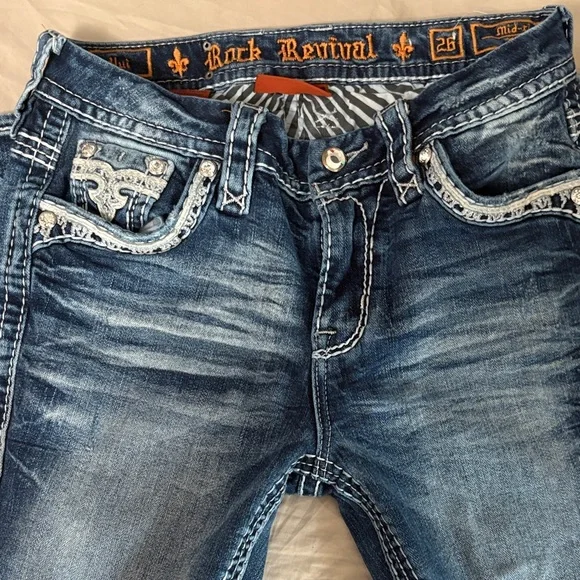 Rock Revival Blue Boot Cut Jeans with Embellished Pockets